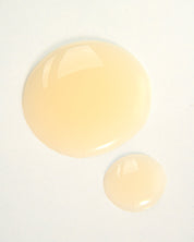 Curly Angels Absolution Shampoo, two droplets against white background - vegan haircare, cruelty-free